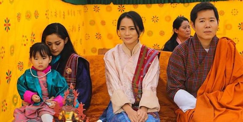 Jetsun Pema with her younger sister Yeatso Lhamo and her husband Price Jigme Dorji Wangchuck