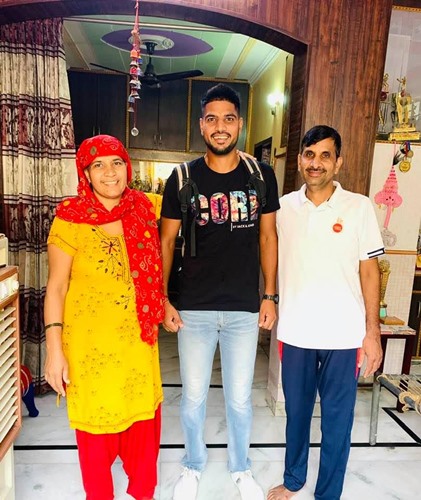 Lalit Yadav with his parents