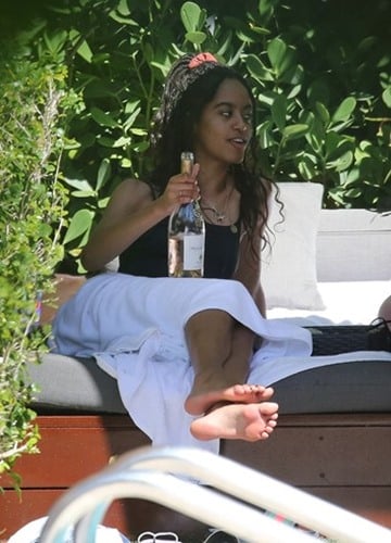 Malia Obama drinking wine during her vacation