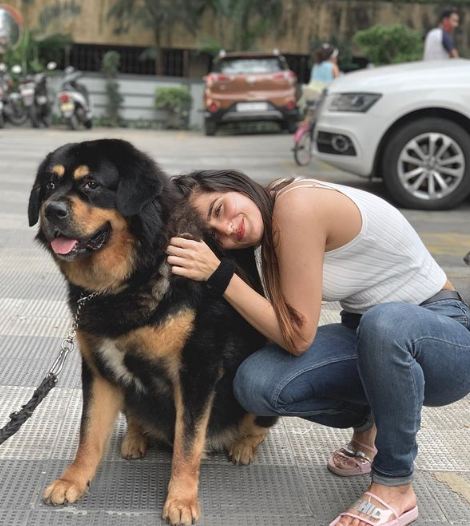 Riya Kishanchandani with her pet dog