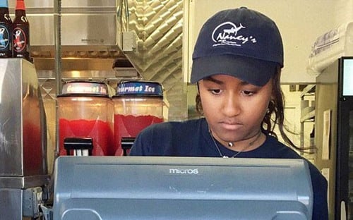 Sasha Obama working as a cashier at a sea food restaurant