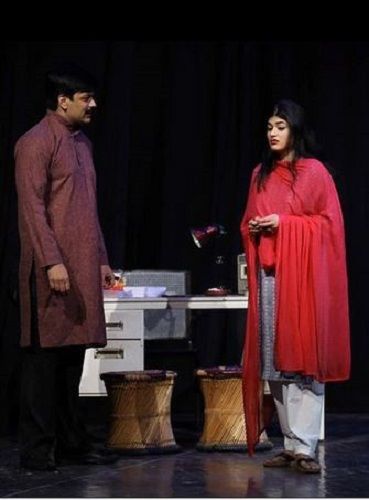 Tasneem Khan performing in a theatre play