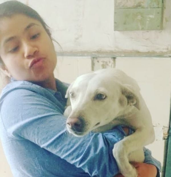 Akanksha Sharma with a dog