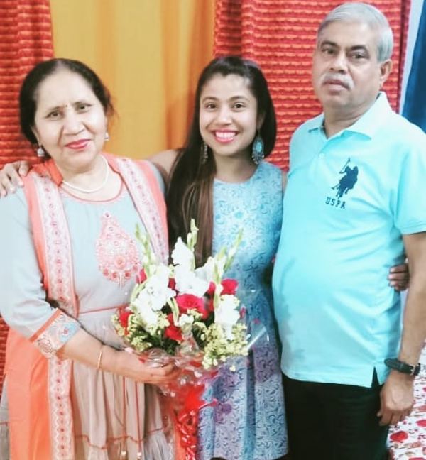Akanksha Sharma with her parents