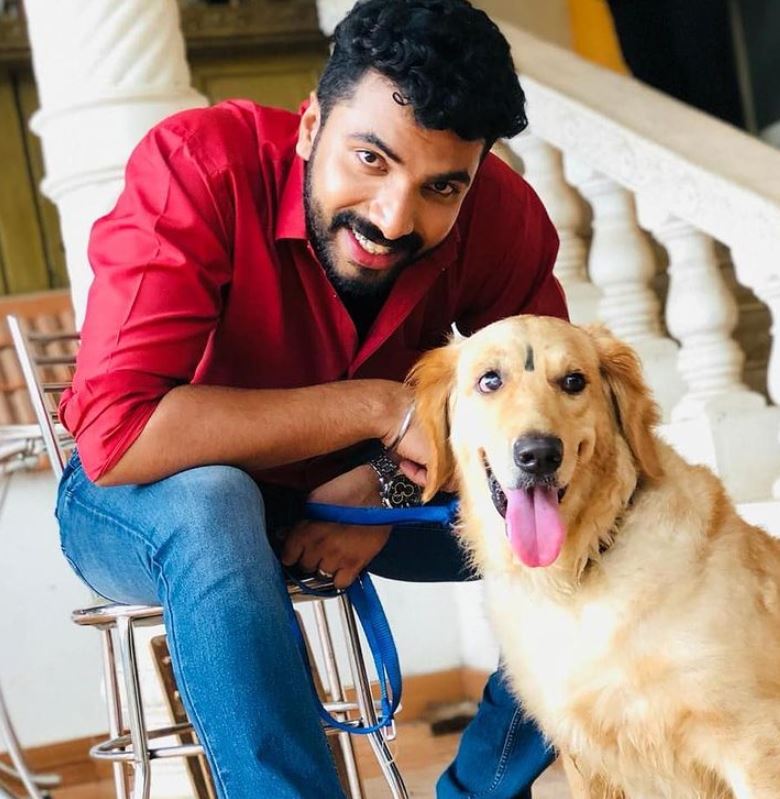 Anoop Krishnan with his pet dog