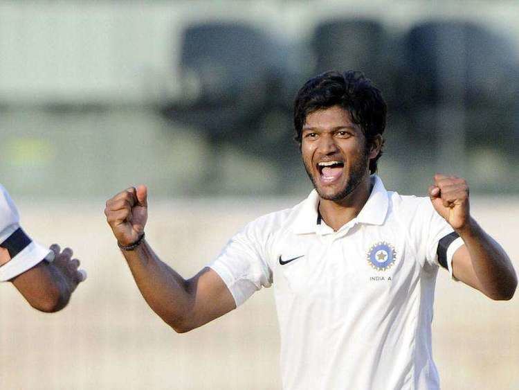 Jalaj Saxena celebrating the wicket of an Australia A batsman on his debut match for India A