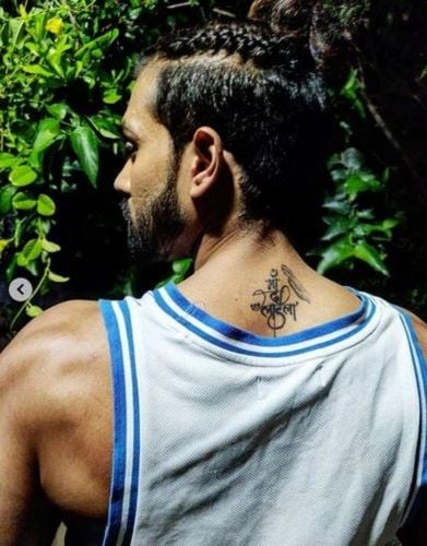 Karan Khanna's tattoo on back
