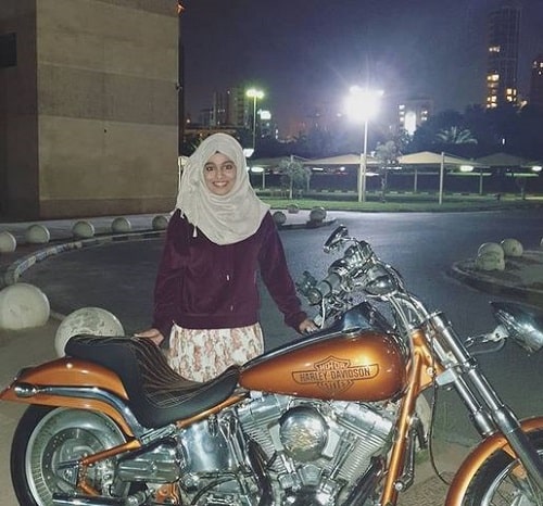 Majiziya Bhanu with her motorcycle