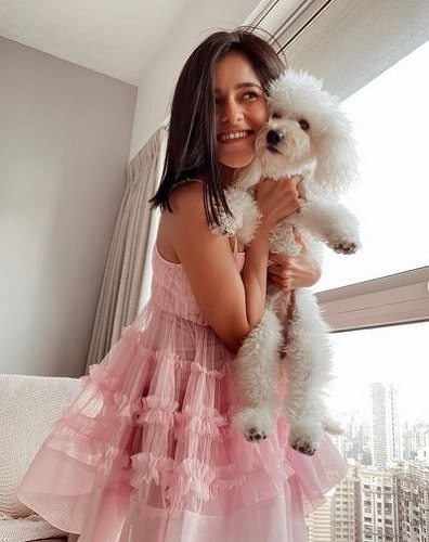 Meghna Kaur with her pet dog