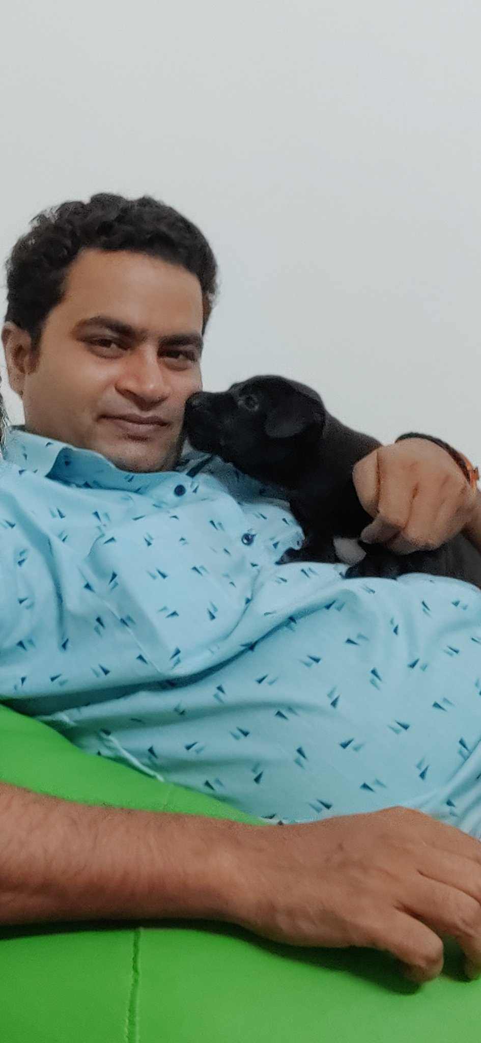 Vikas Sharma with his pet dog Coco