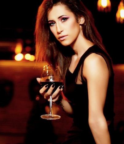 Aditi Rajput with a glass of wine