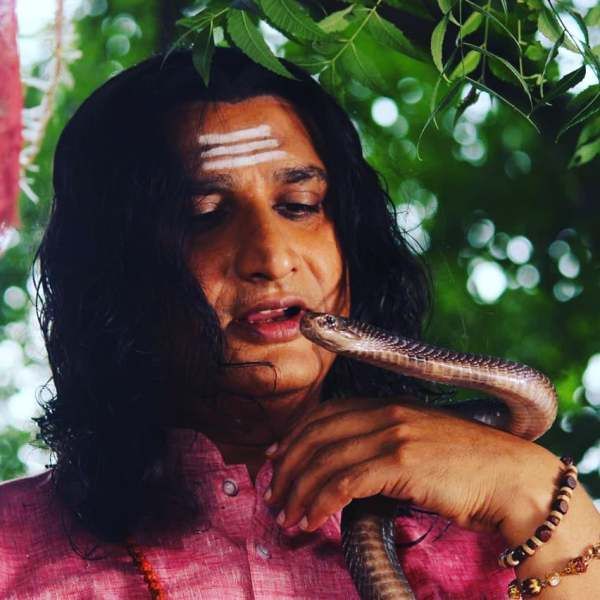 Awdhesh Mishra with snake Cobra