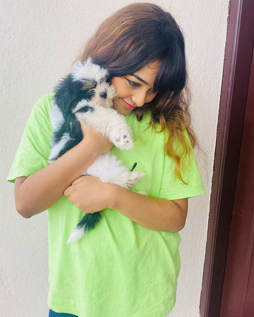 Dhanushree with her pet dog 