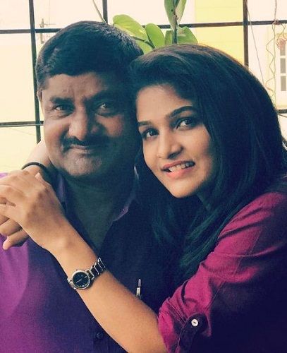 Divya Suresh with her father