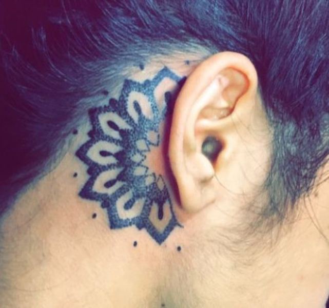 Aarushi's dot work tattoo behind her ear