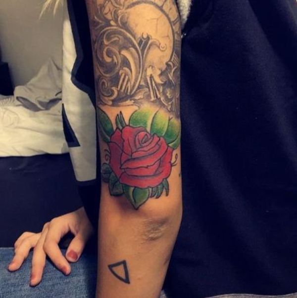 Aarushi's rose tattoo