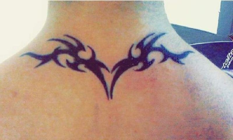 Aarushi's tattoo on the back of her neck