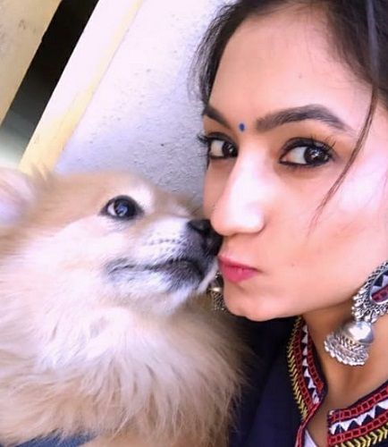 Vaishnavi Gowda with her pet dog