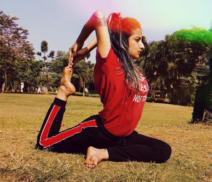 Rashmeet performing yoga