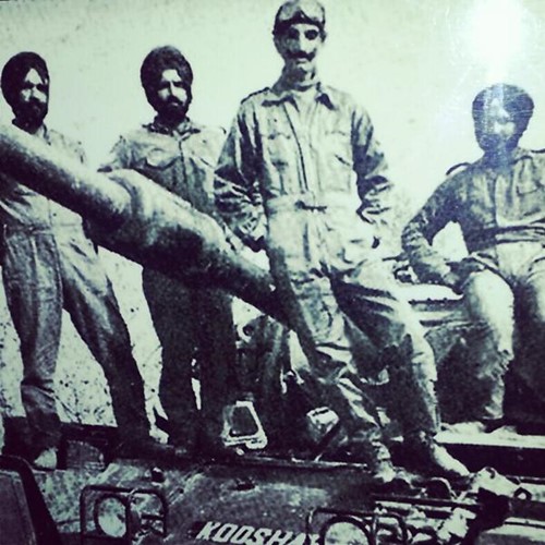 Hanut Singh posing on top of a tank with his fellow soldiers after the Indo-Pak war of 1971