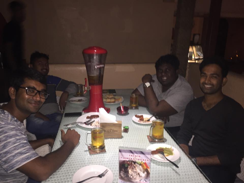 Harsha Chemudu with glass of alcohol