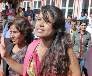Nihita Biswas, along with her mother, walking out of the Supreme Court of Nepal after a court hearing in Sobhraj's case