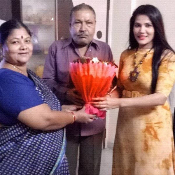 Seema Singh with her parents