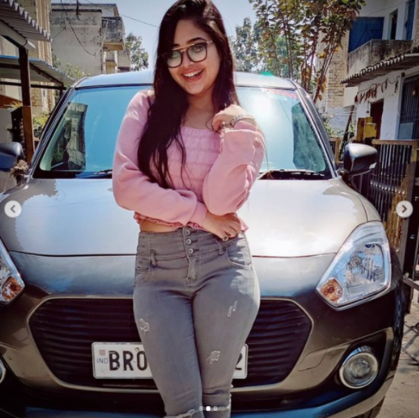 Sneha Upadhya with her Swift Dzire car