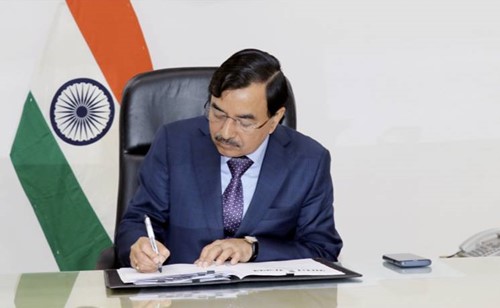 Sushil Chandra signing documents before taking charge as the Election Commissioner