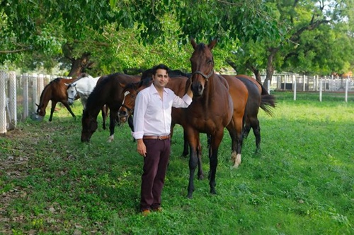 Adar Poonawalla with his horses at his farm house