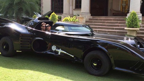 Adar Poonawalla with his son in the Batmobile