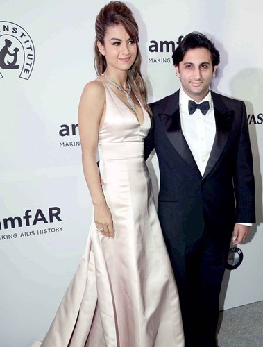 Adar Poonawalla with his wife, Natasha Poonawalla