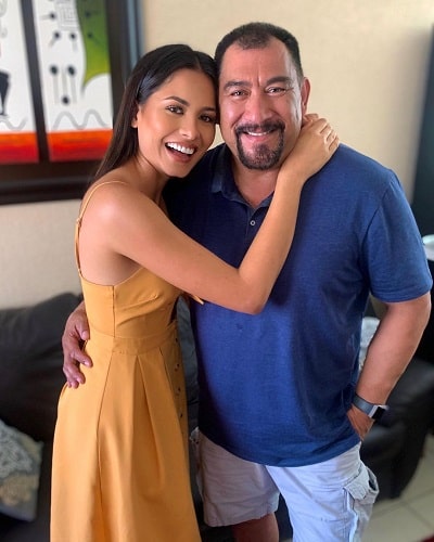 Andrea Meza and her father