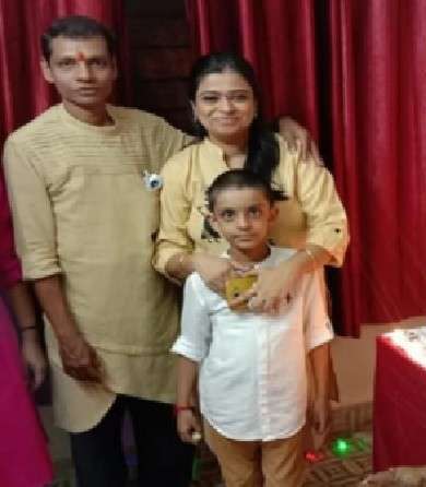Bhushan Kadu with his wife and son