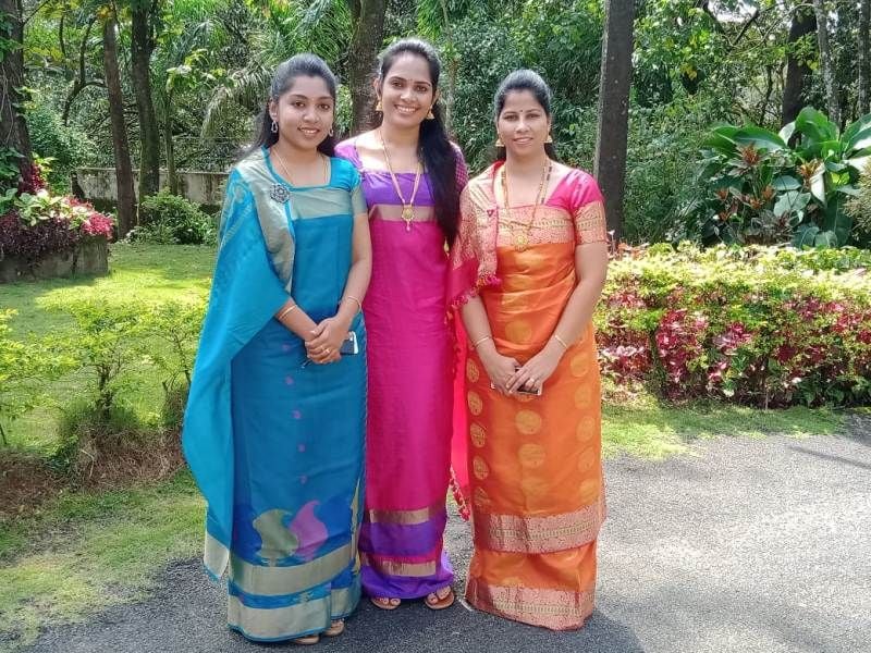 DC Annies Kanmani Joy (in the middle), SP Suman D Pennekar ( right) and ZP CEO K Lakshmi Priya (left) in traditional Kodava dress in Madikeri Dasara event