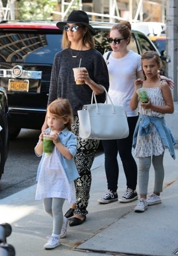 Jessica Ditzel with her daughters, and their nanny (white tshirt)