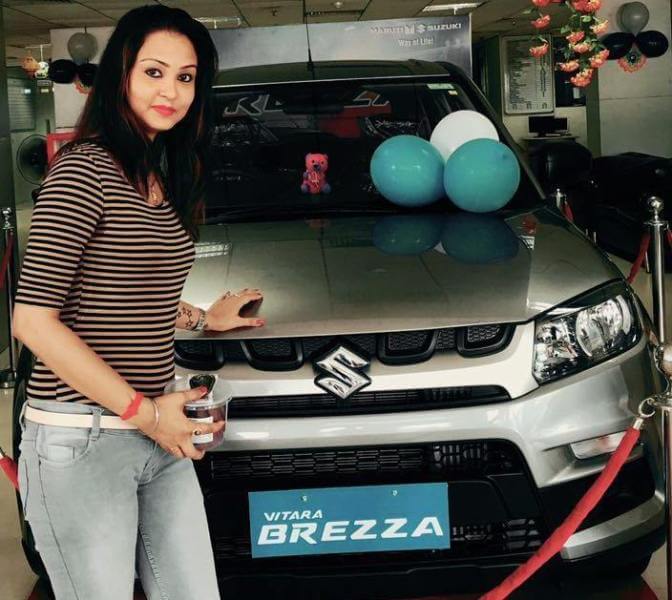 Kanak Yadav with her Maruti Suzuki Vitara Brezza car