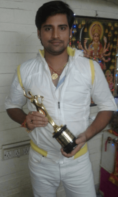 Rakesh Mishra with the Best Debut Award 2013