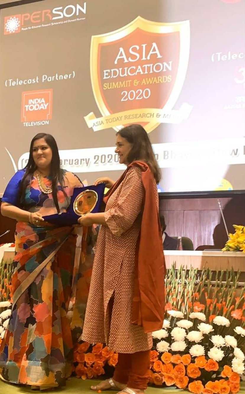 Savi Kumar with her Asia Education Summit & Awards