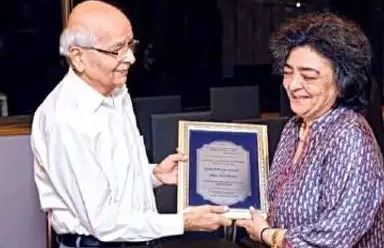 Zia while receiving Award from the Baha’i community on International Women's Day 2020