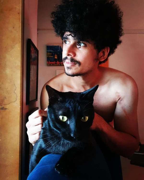 Imaad Shah with his pet cat