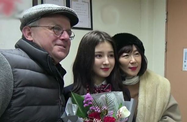 Nancy with her parents
