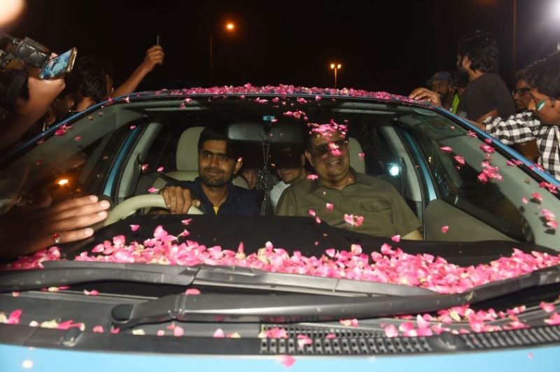 Pakstani fans celeberating ICC Champions Trophy by showering petals on Babar Azam's car