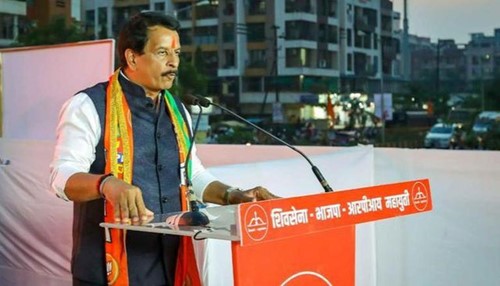 Pradeep Sharma addressing the crowd during an election rally speech
