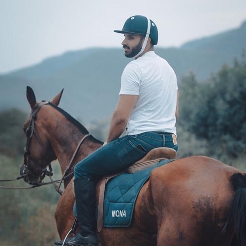 Rahim Pardesi riding a horse