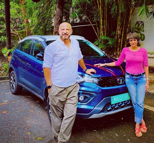 Raj Kaushal with his wife and car