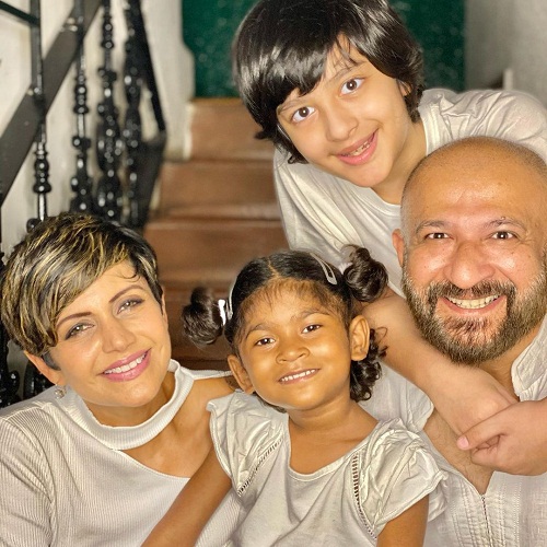 Raj Kaushal with his wife and children