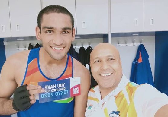 Ashish Kumar with his coach