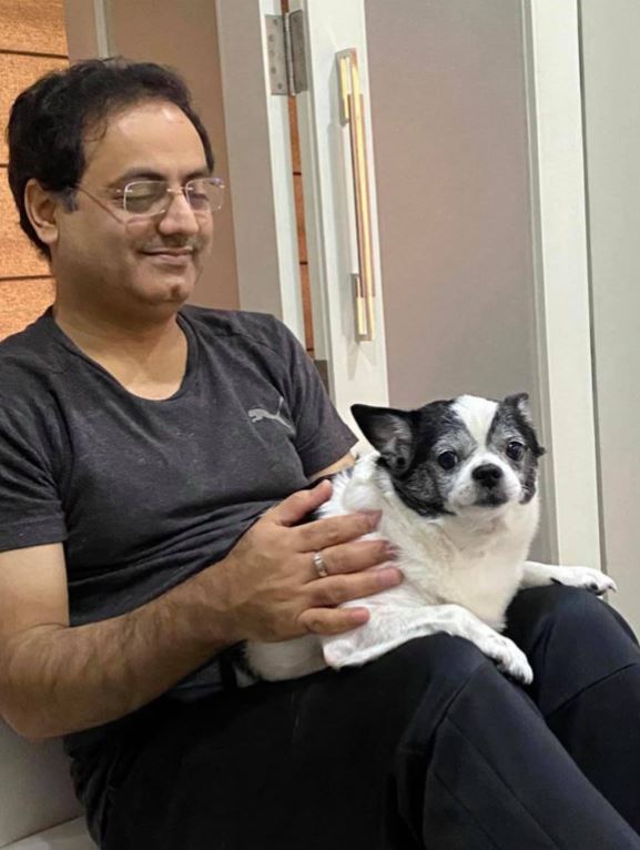 Dr Vikas Divyakirti and his pet dog
