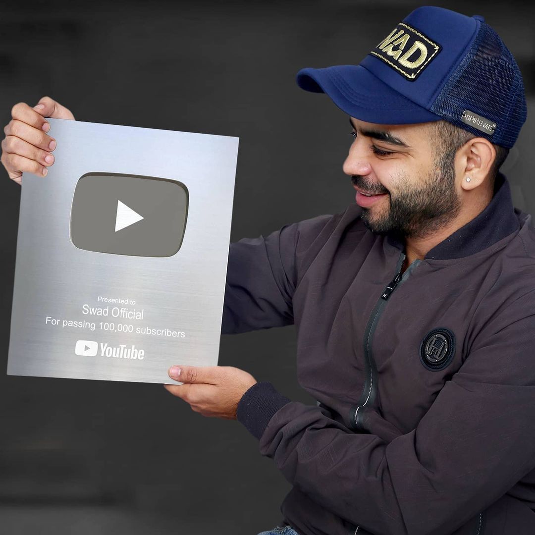 Gaurav Wasan with his YouTube Silver Play Button